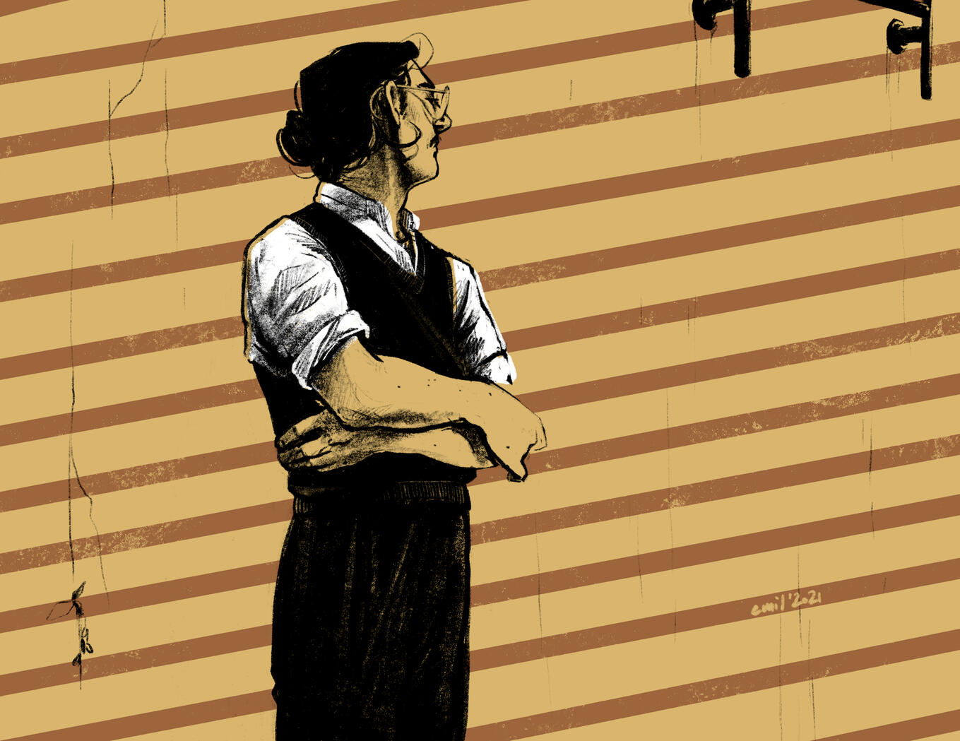 A young white man standing with his arms crossed in front of a stylised yellow stripy background.
